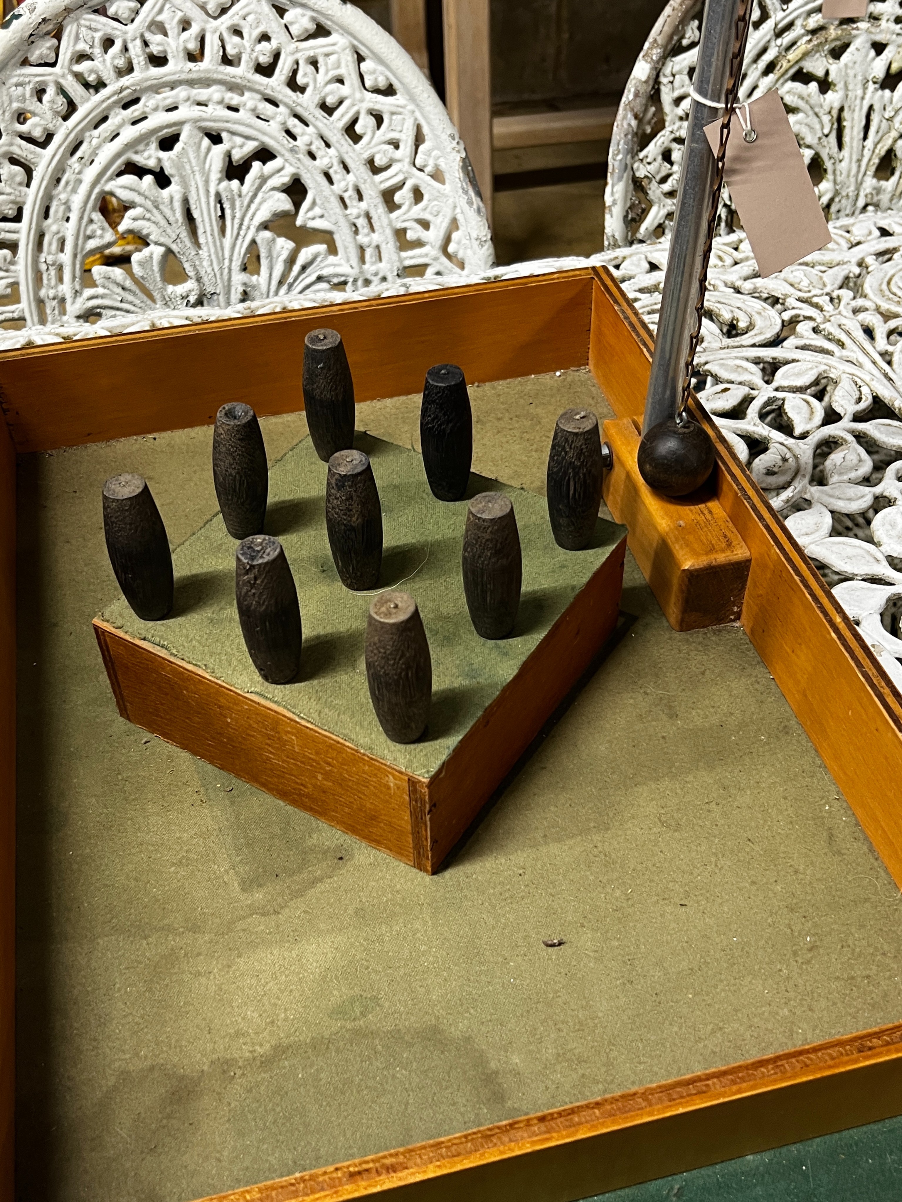 A vintage Lindop table skittles game and a Victorian mahogany till